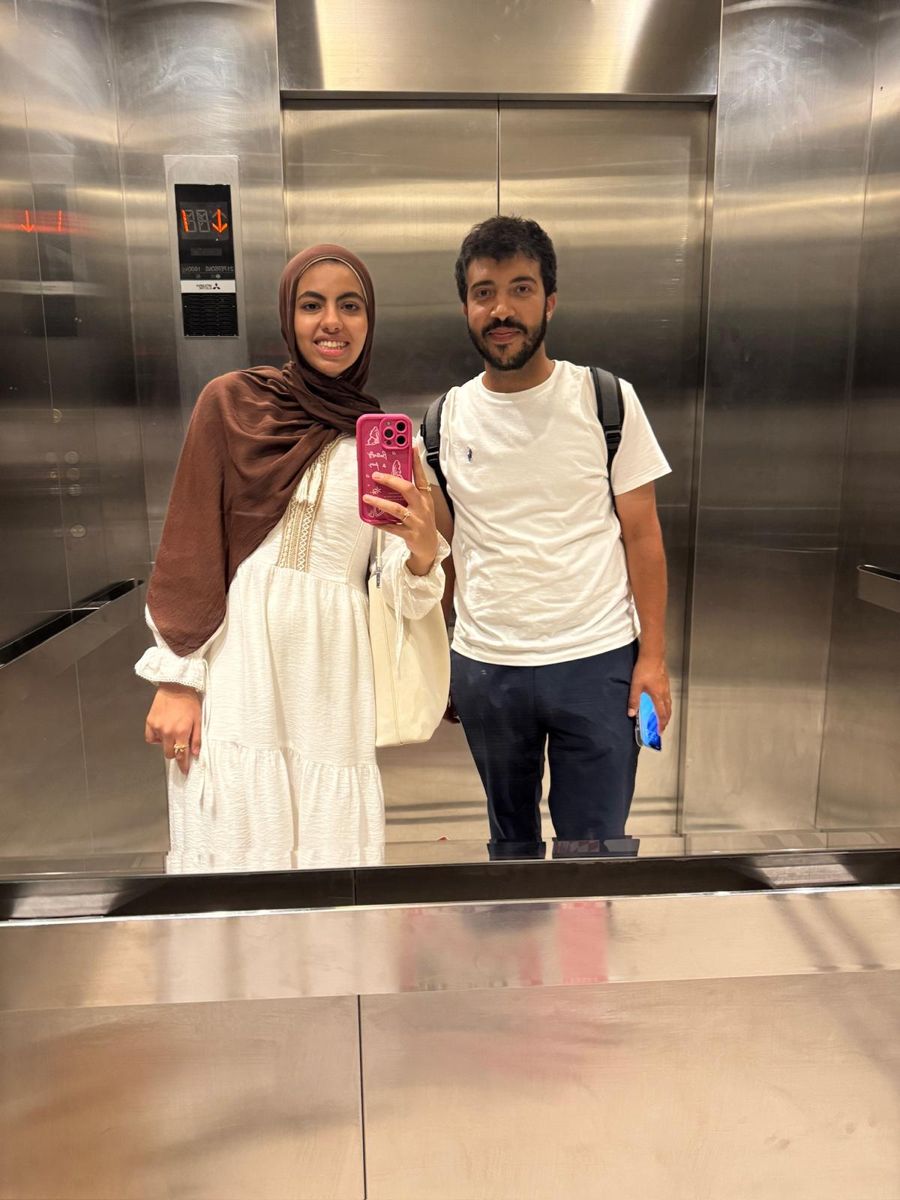 Mirror selfie of us in an elevator